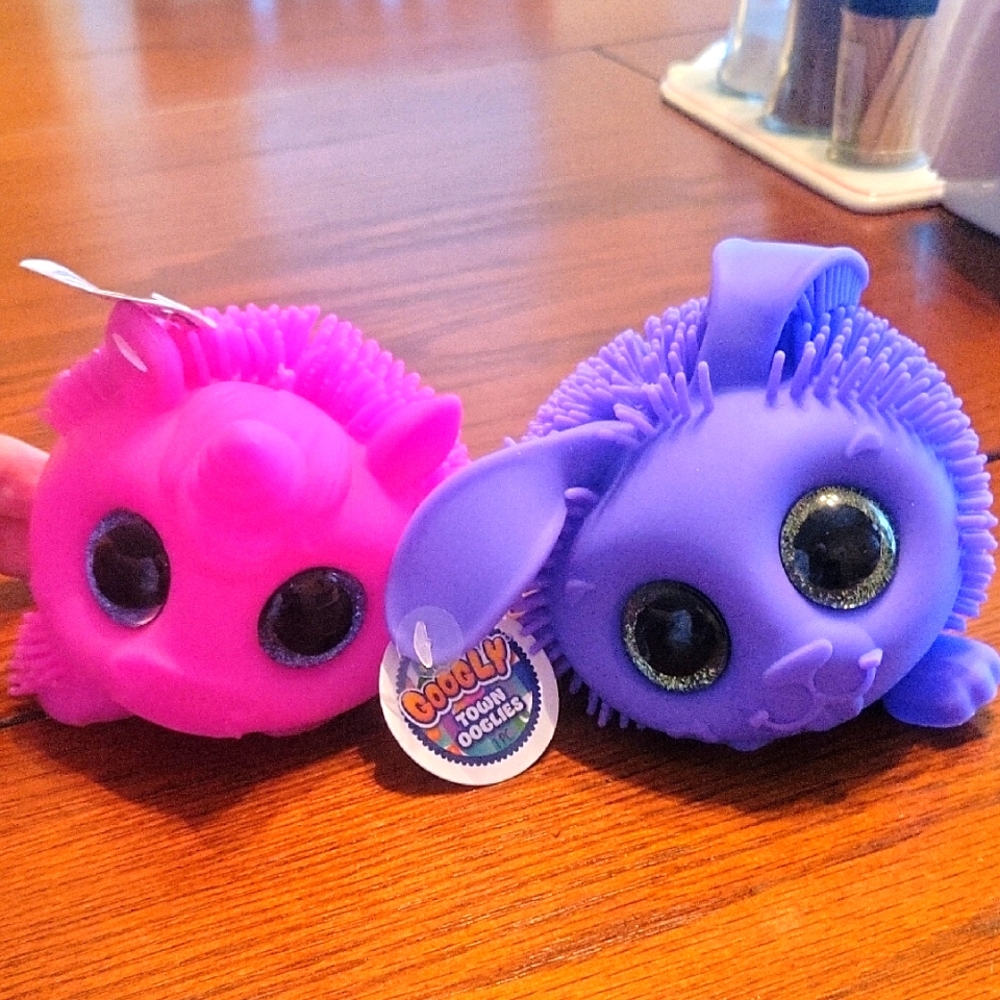 Vibrant Pink and Purple Plush Toy Creatures